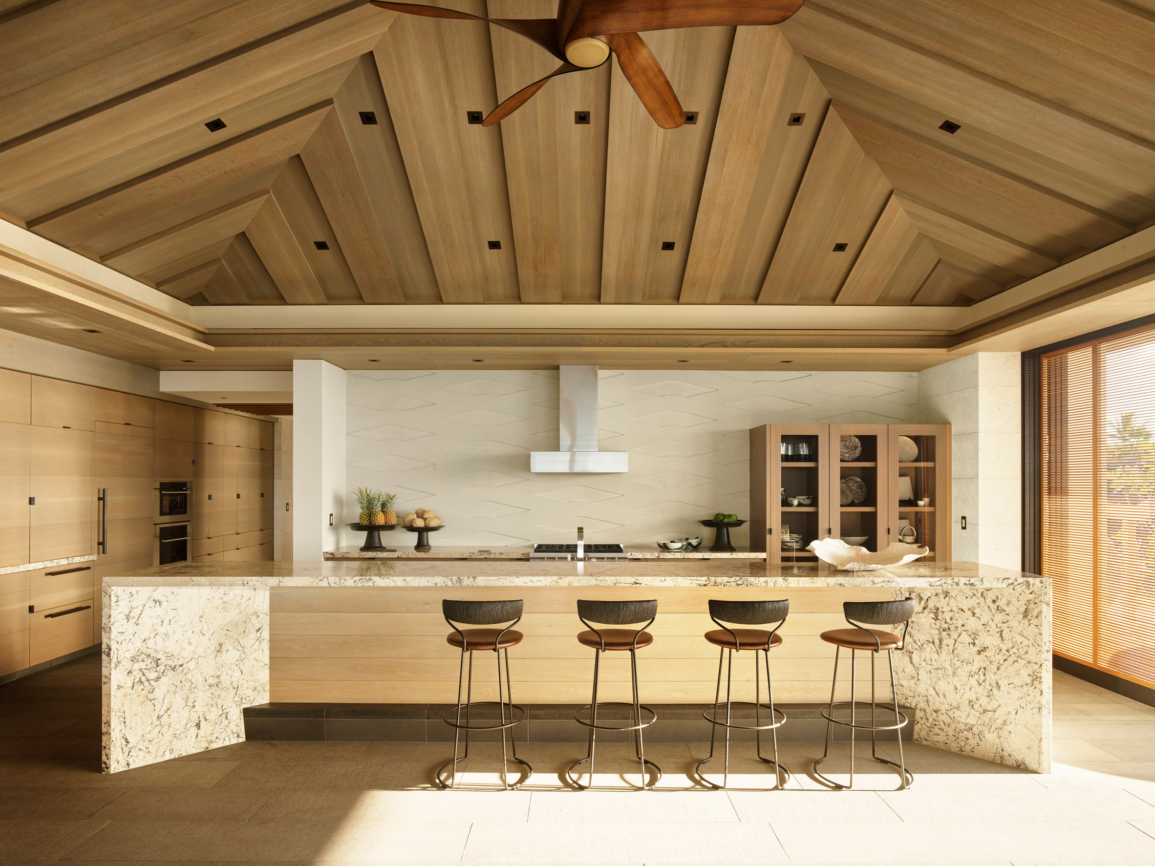 A muted palette of wood is seen in the kitchen