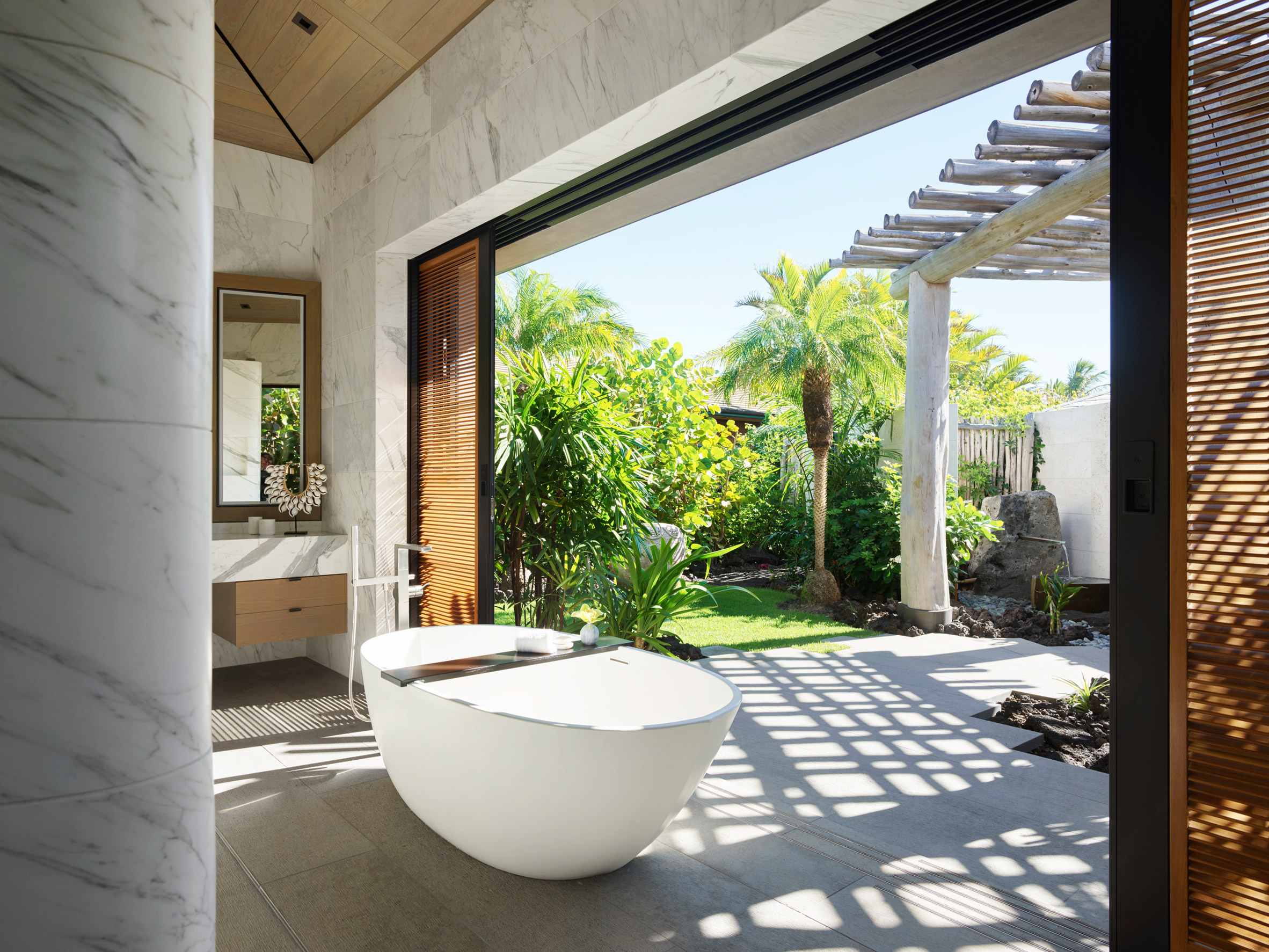 Marble clads the bathroom designed by de Reus Architects