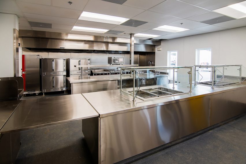 A commercial kitchen features in the complex by NAC Architecture and Bernards