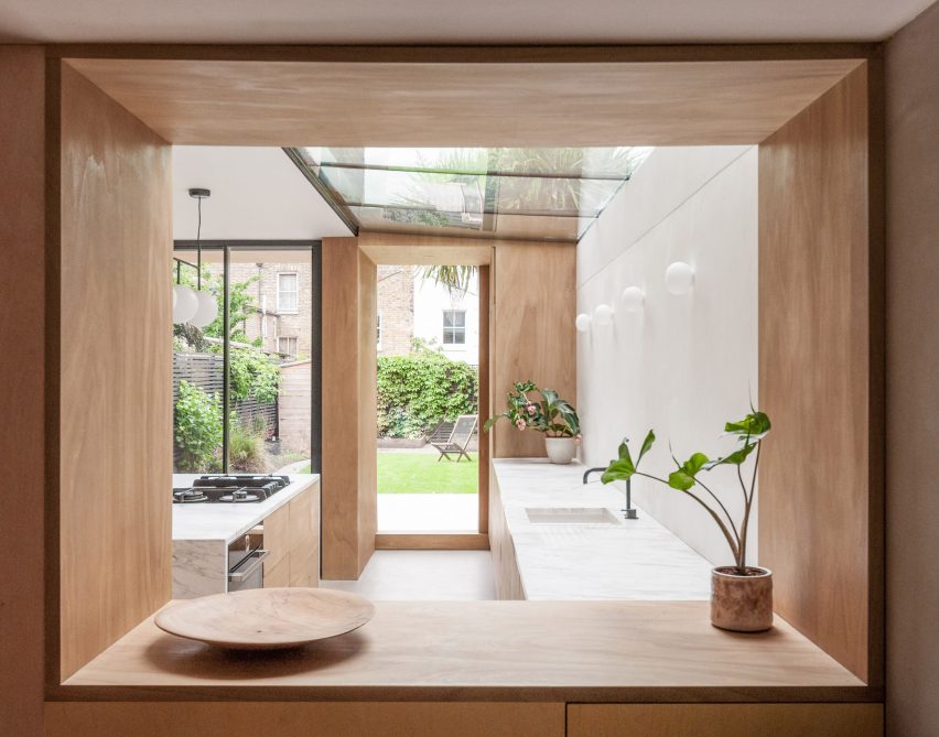 A view into a white-walled kitchen in London