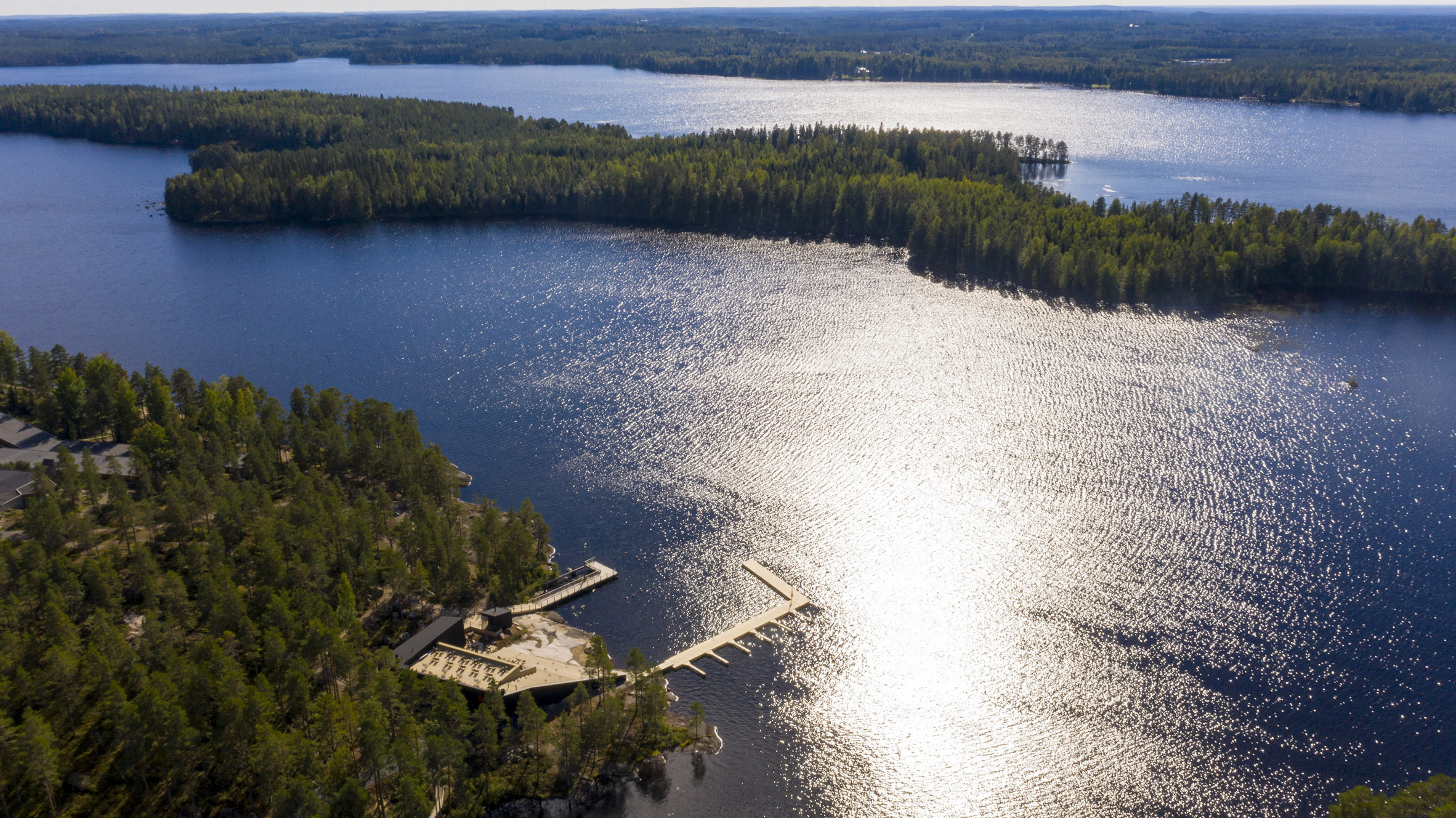 An aerial view of a lakeside wellness centre