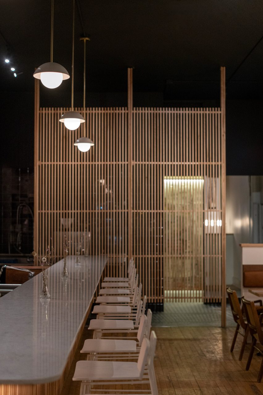 Wine bar in Montreal with a slatted privacy screen