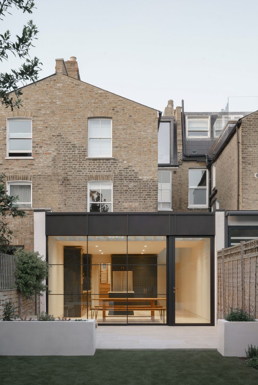 Rear facade and garden of T-House by Will Gamble Architects
