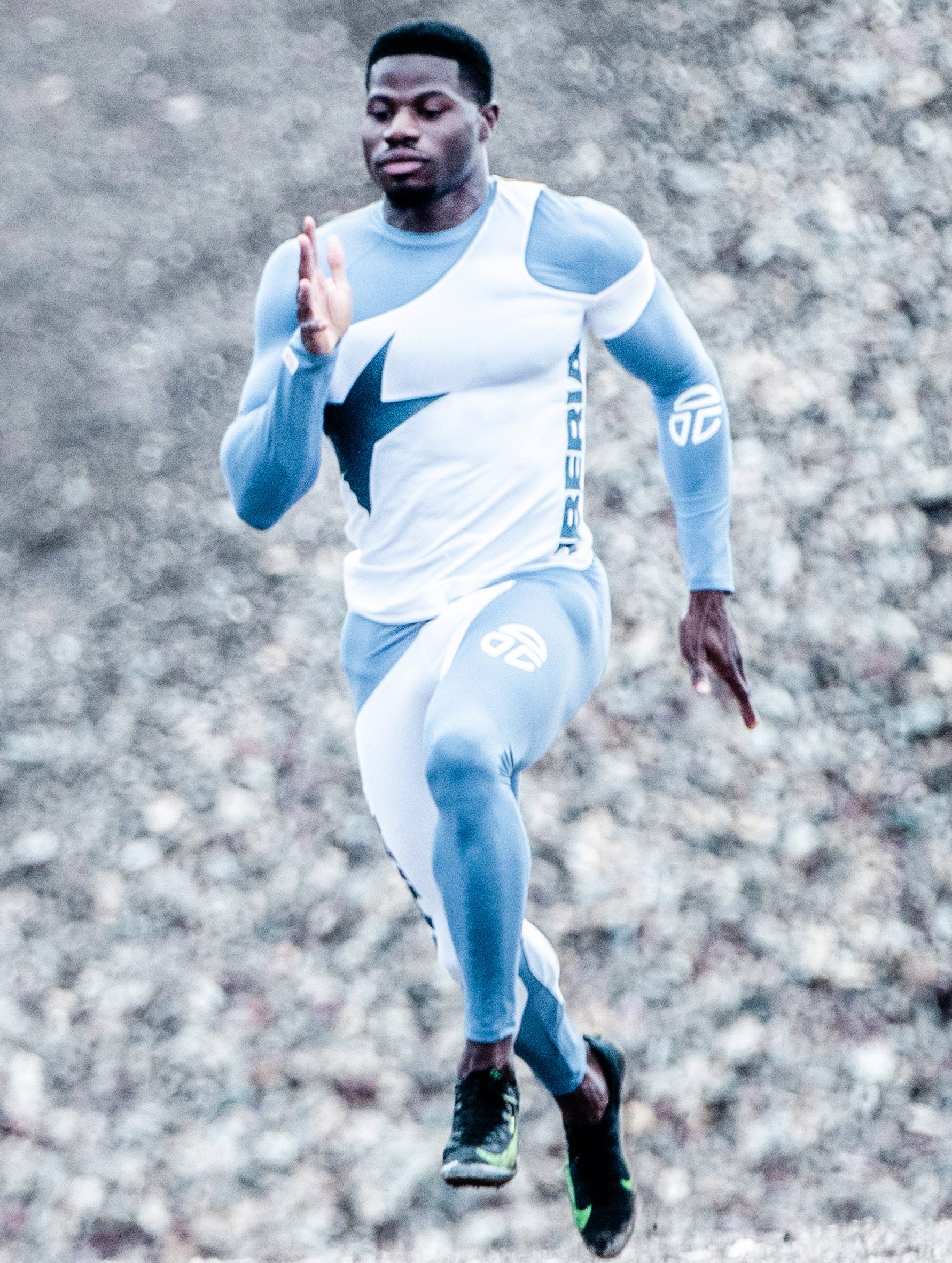 Liberian sprinter Emmanuel Matadi running in Telfar's uniform