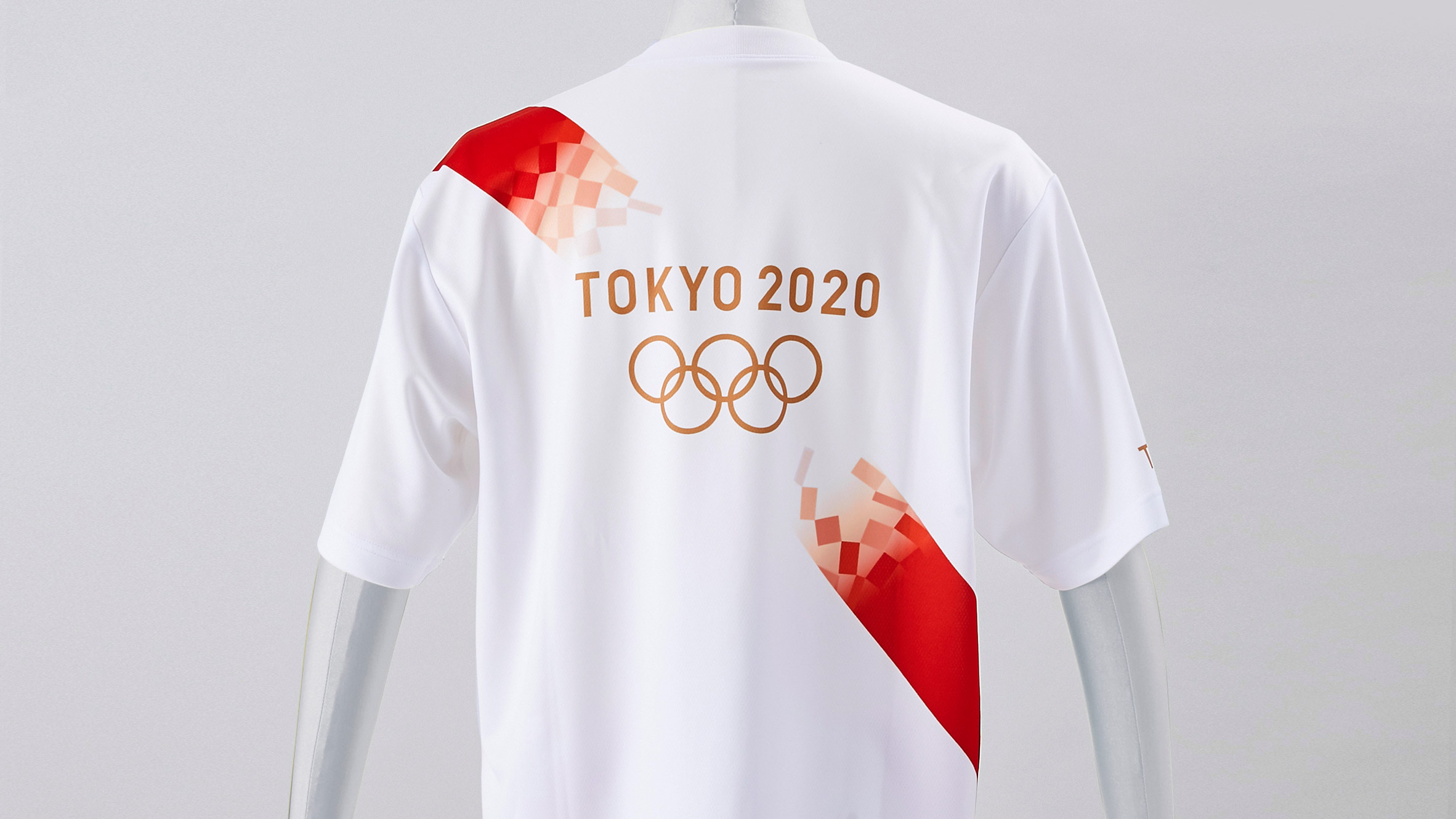 Tokyo Olympic torchbearers wear uniforms made from plastic bottles