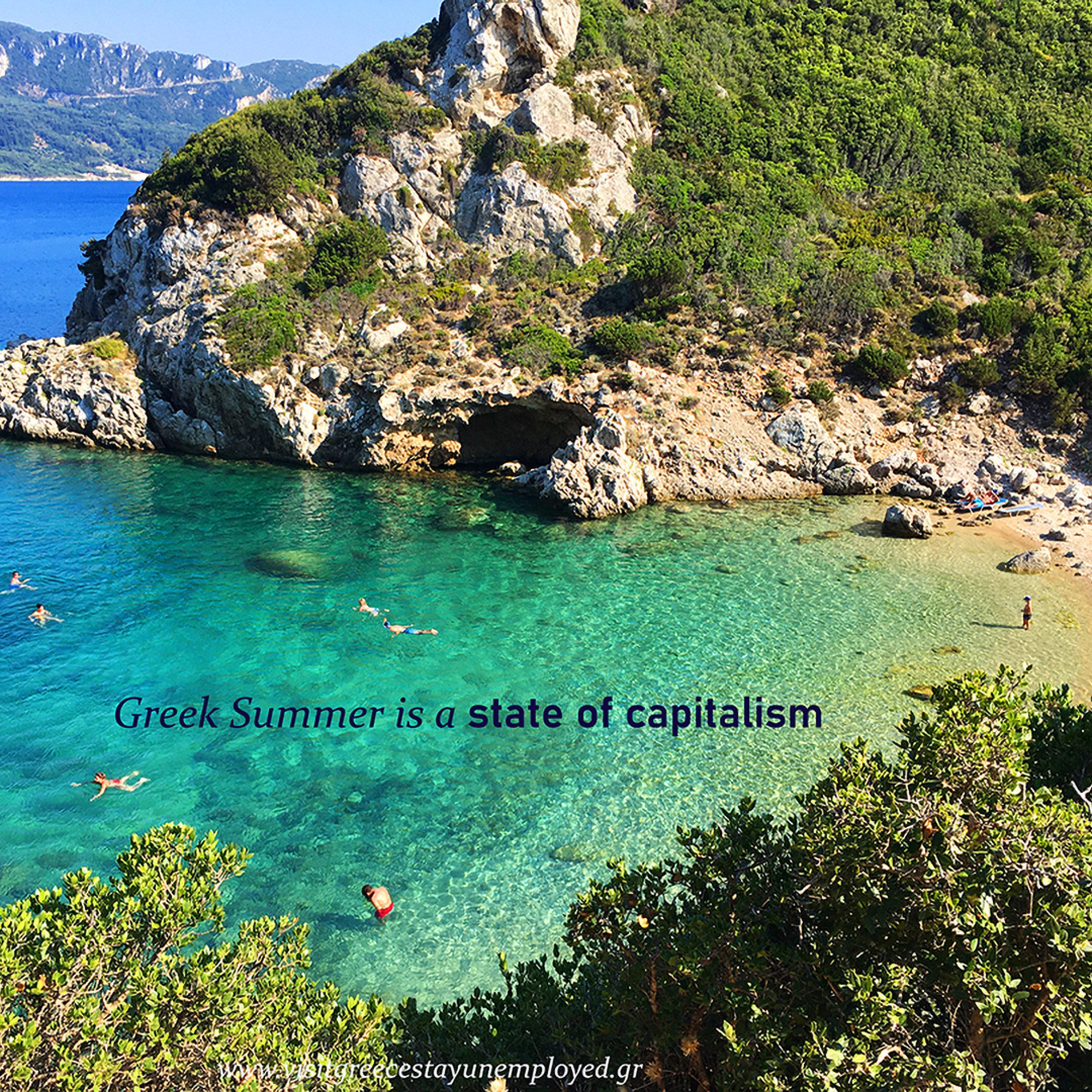 A beach in Greece with green and blue water