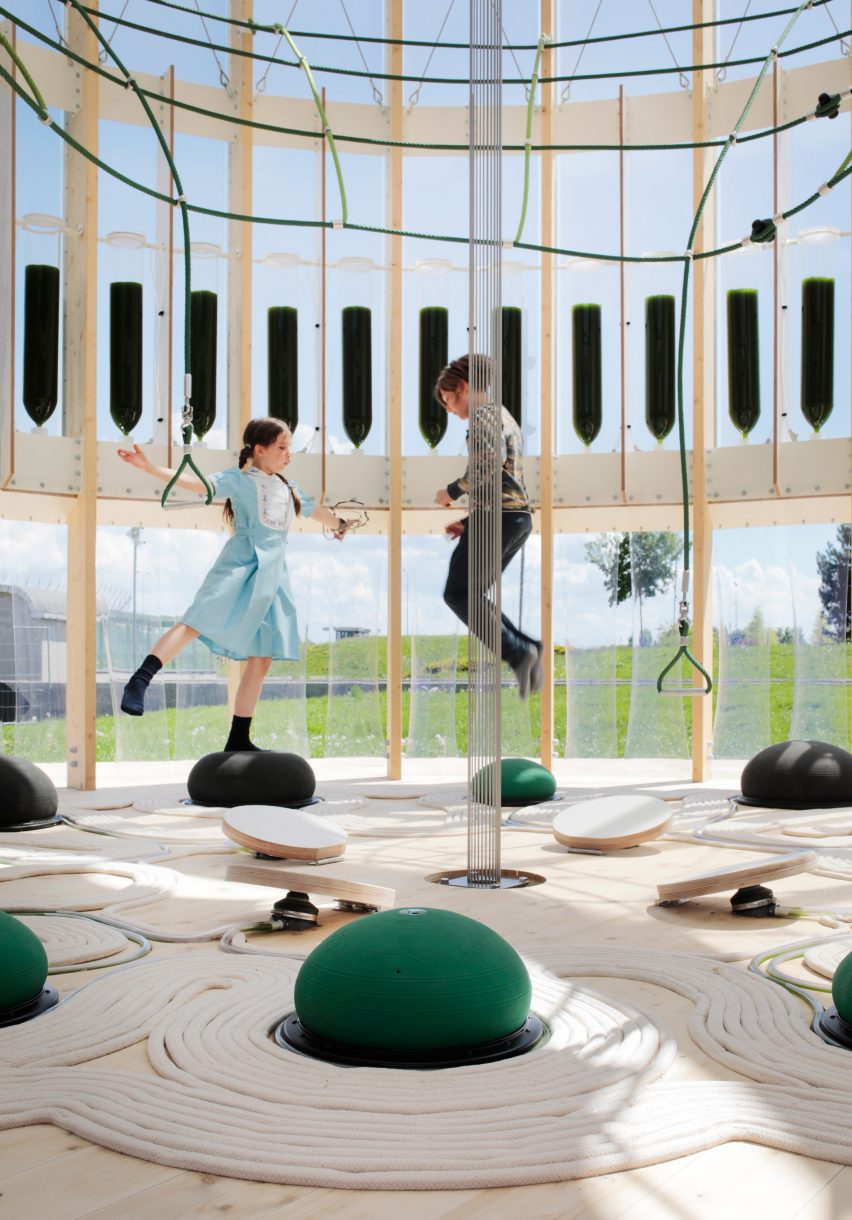 Children bounce on spheres inside the AirBubble playground