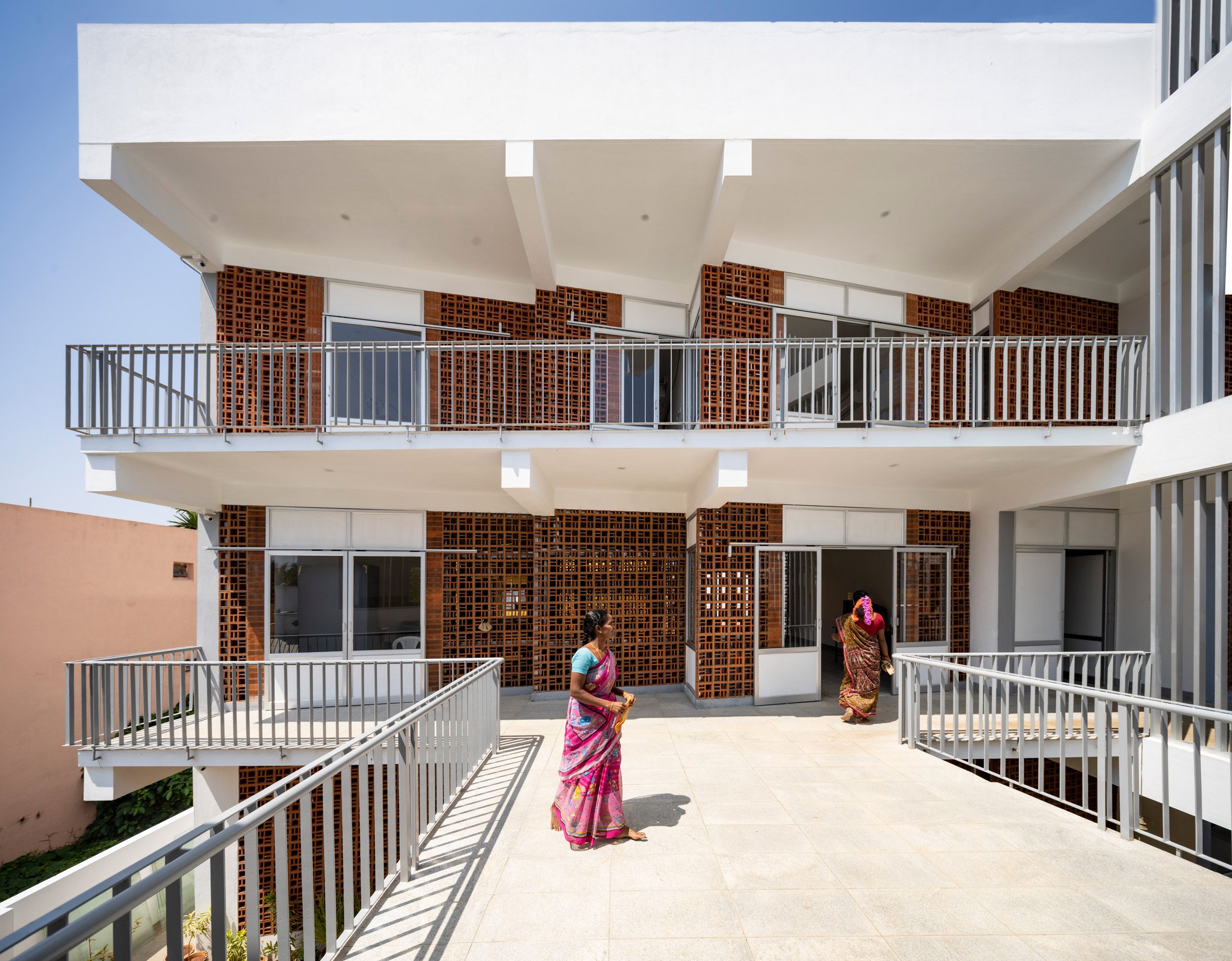 Sharana daycare by Anupama Kundoo has a brick and white painted exterior