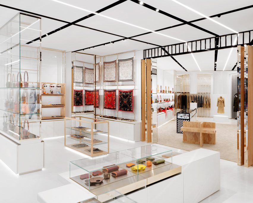 No.1 Sloane Street store by Vincenzo De Cotiis with accessories displayed in champagne-coloured steel units