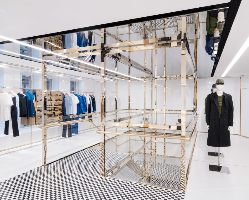 Champagne-coloured steel staircase with checked tiles in Burberry London flagship