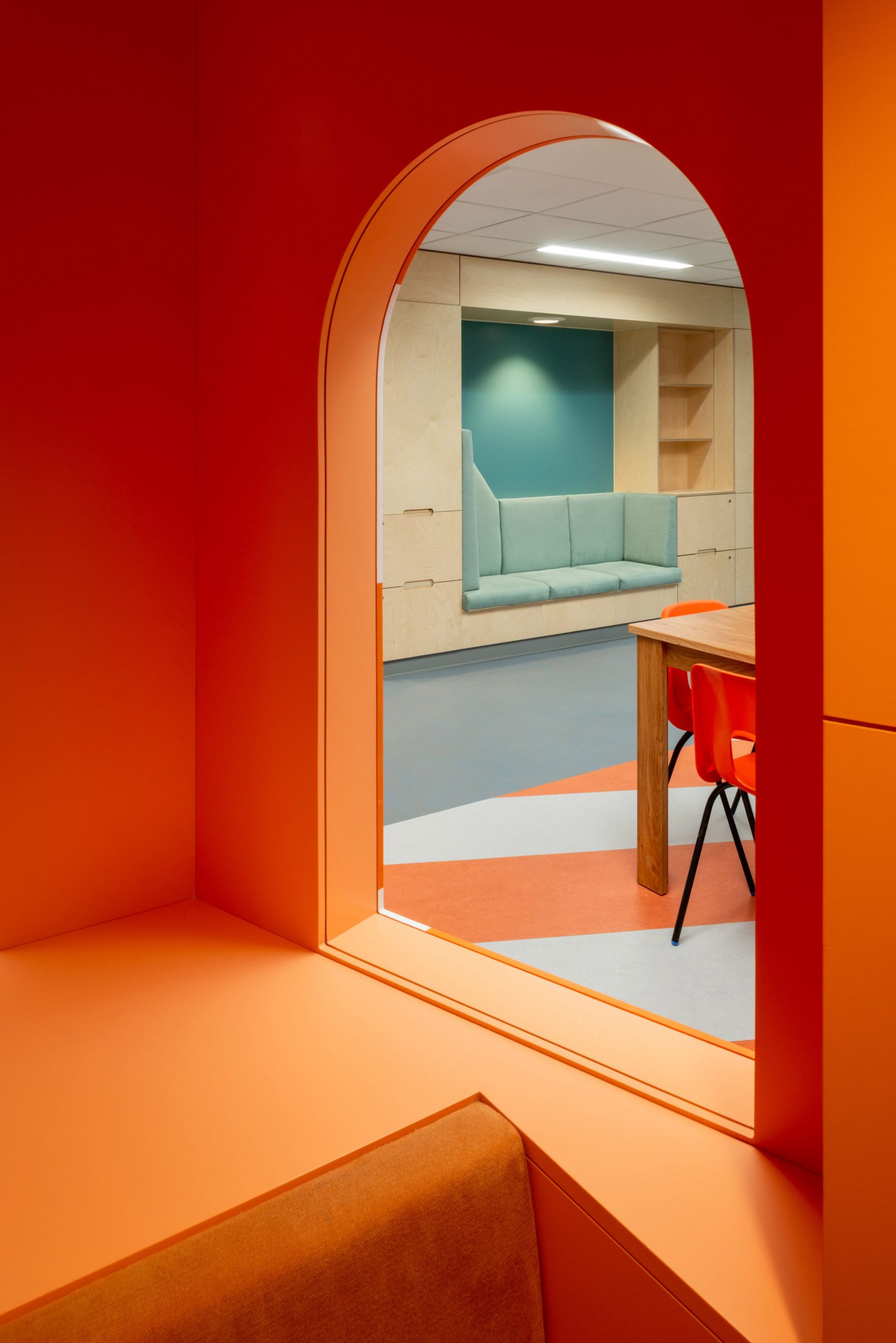 Orange lighthouse interior at CAMHS Edinburgh mental health unit by Projects Office