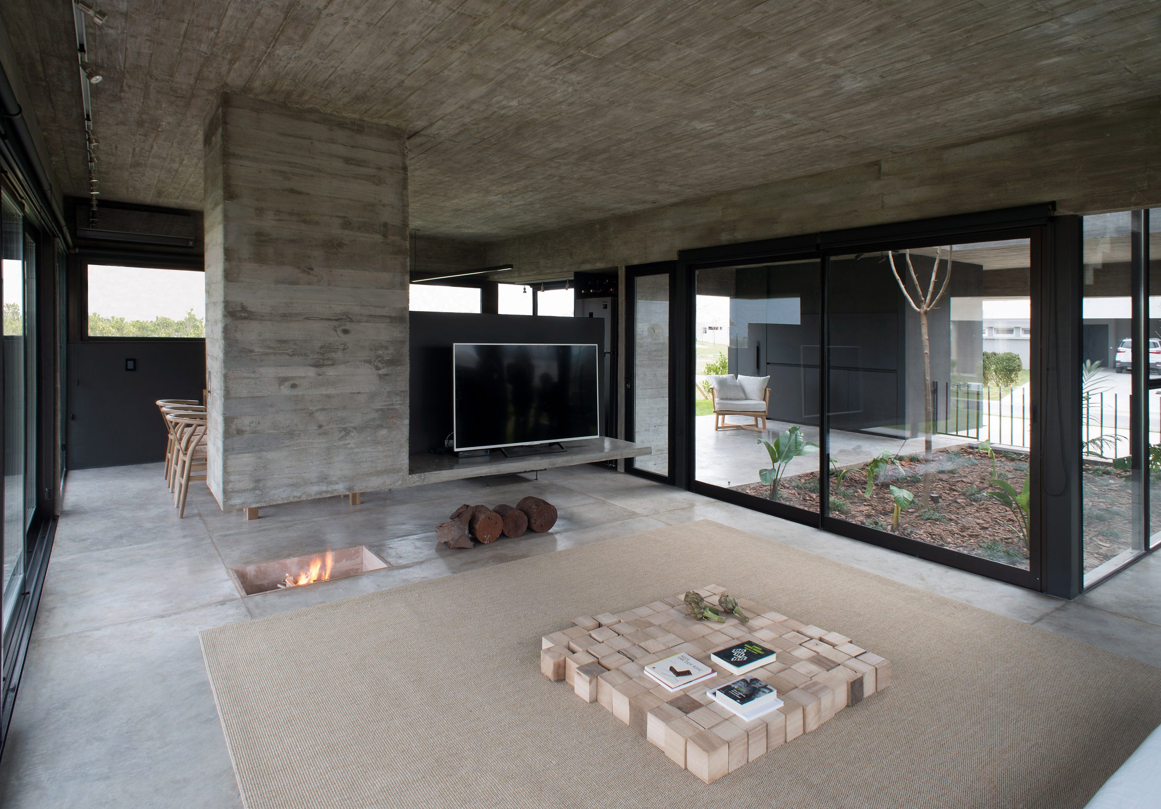 Concrete living room by María Belén García Bottazzini and Ekaterina Künzel