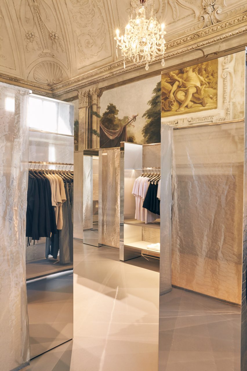 Mirrored displays with mesh curtains in store