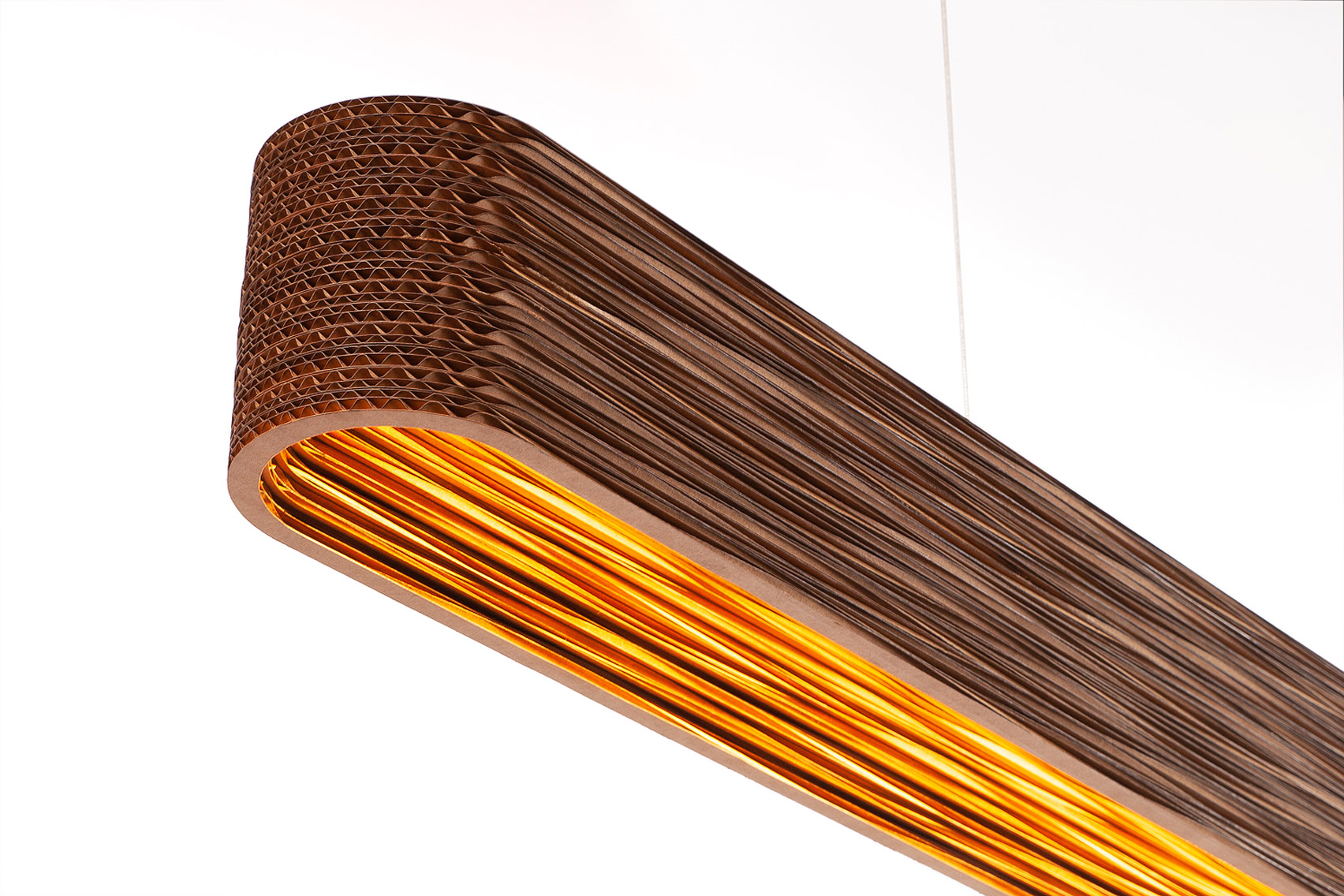 Dash Linear lighting by Graypants in close-up showing the layers of cardboard