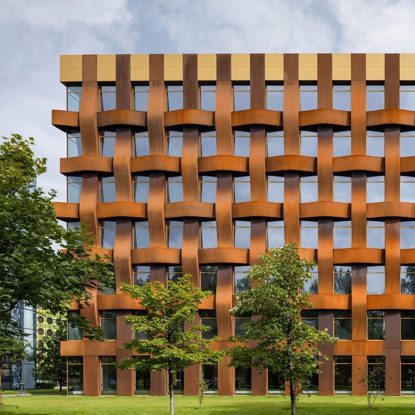 Sergei Tchoban uses Corten steel to create huge basket-weave facade