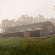 Garrison Architects completes modernist Catskills retreat with 24 elevated cabins