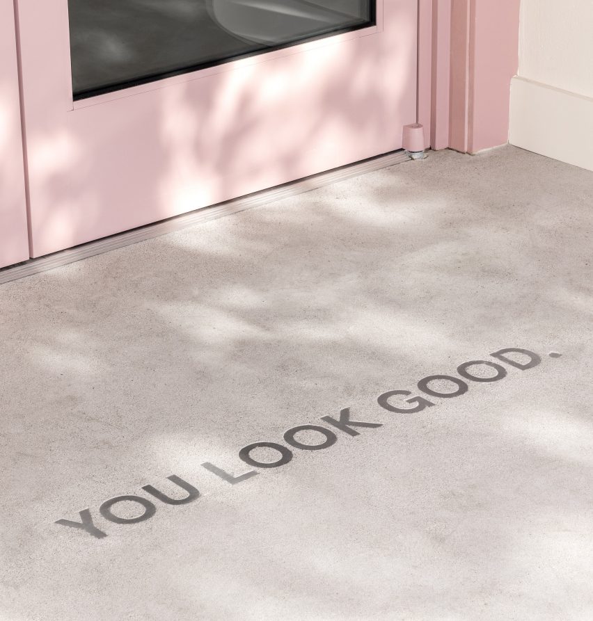 "You look good" written on the threshold
