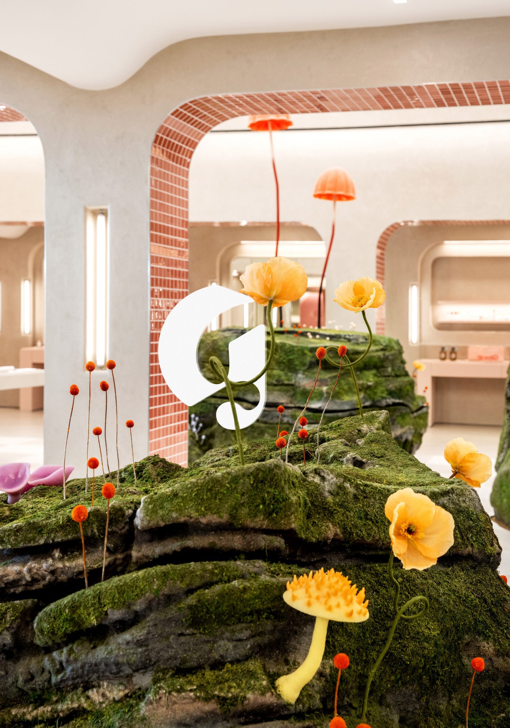 Moss-covered mound in the Glossier store