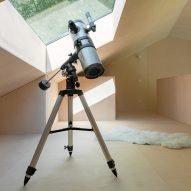 A telescope in the interior of Holiday Home