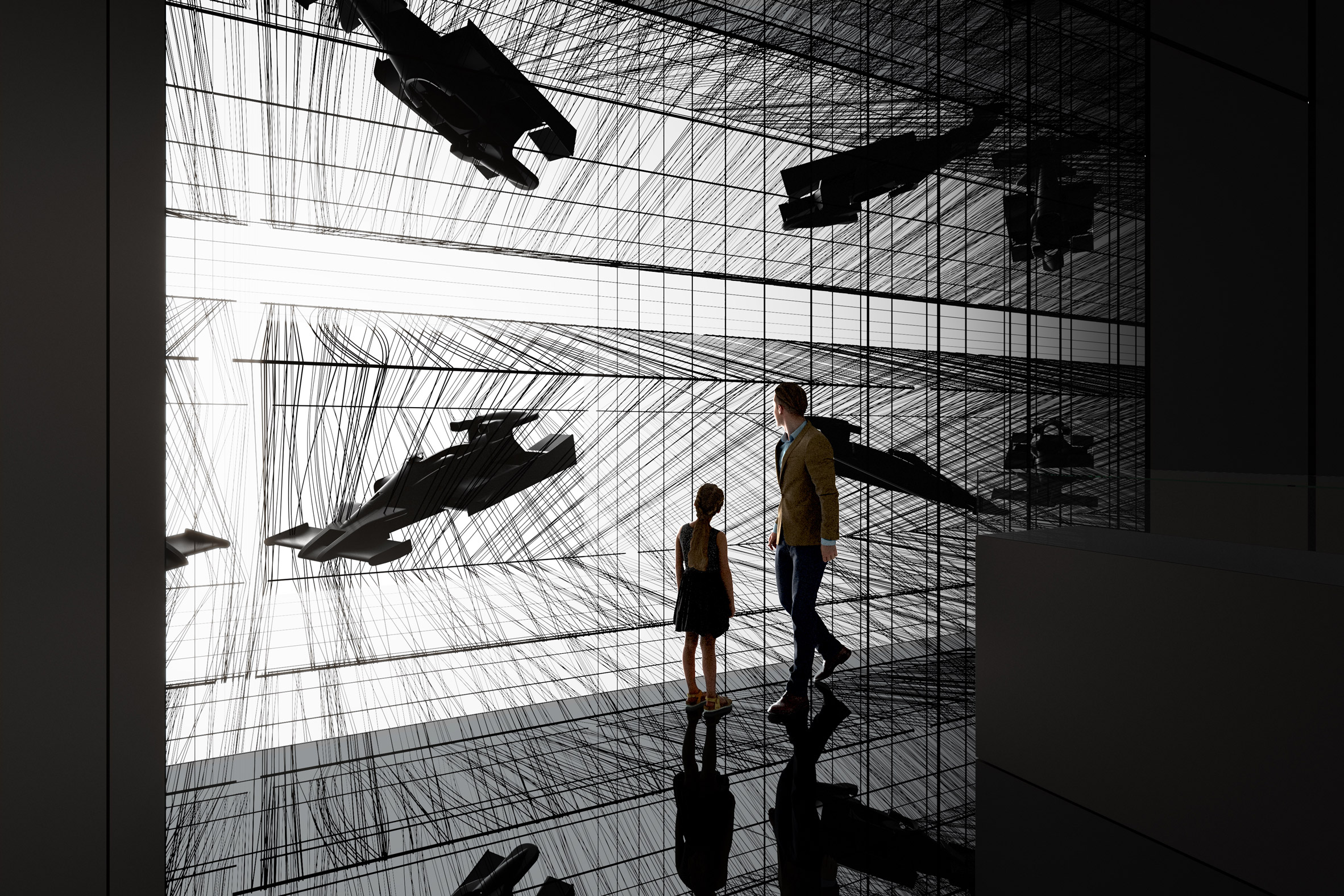 Black room with immersive installations showing carbon fibre objects