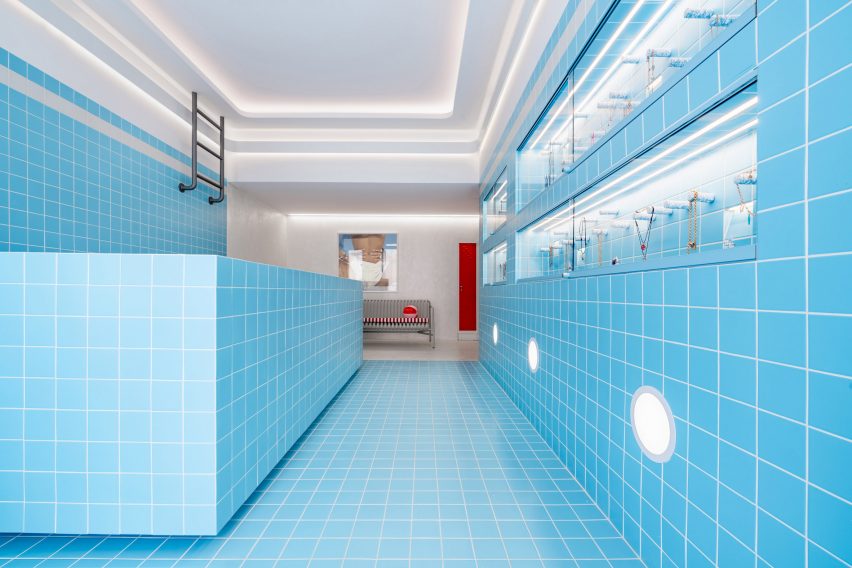 Blue tiled jewellery shop interior informed by Wes Anderson