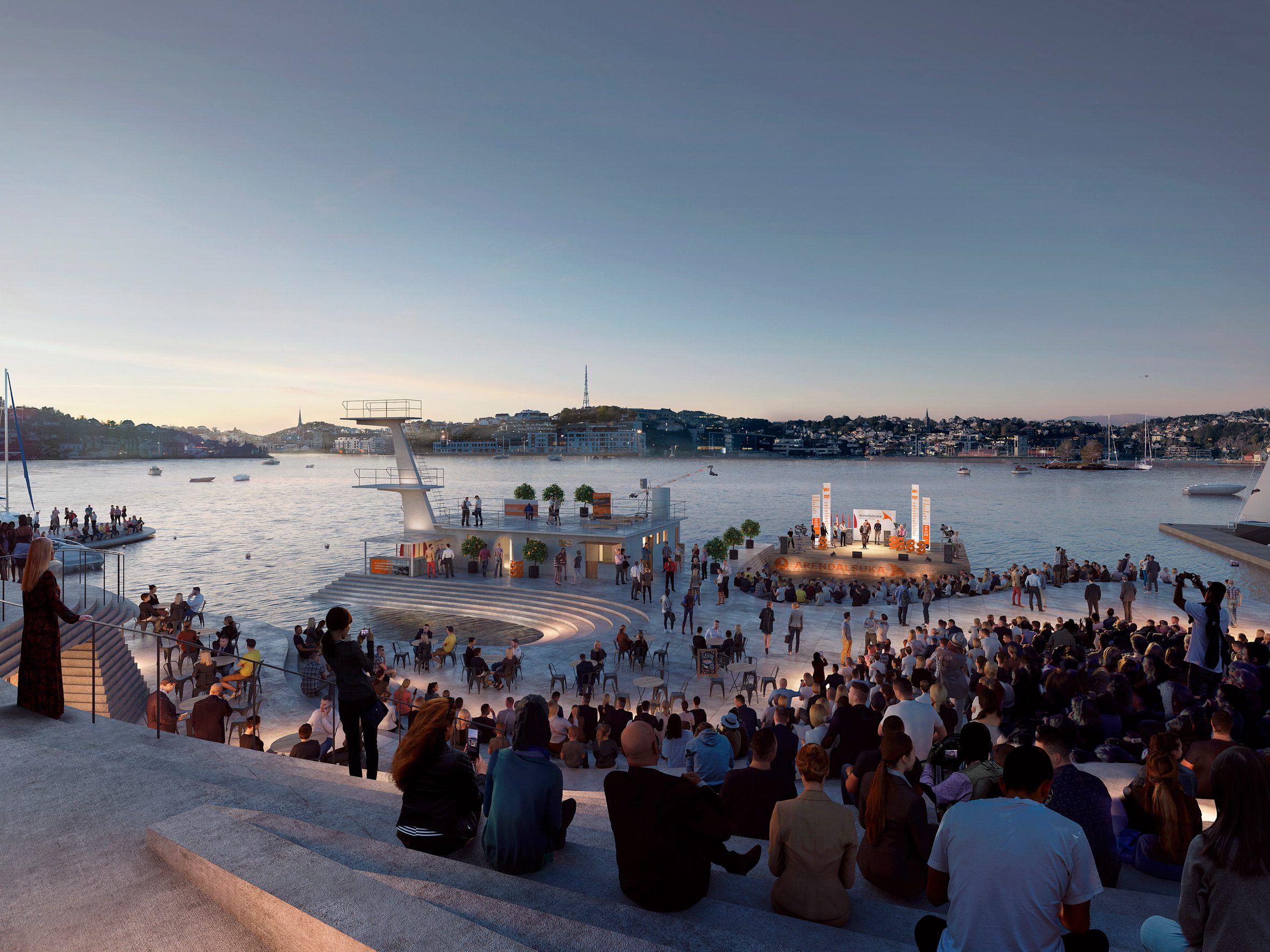 People sitting on amphitheatre seating watching an open-air performance on the harbour