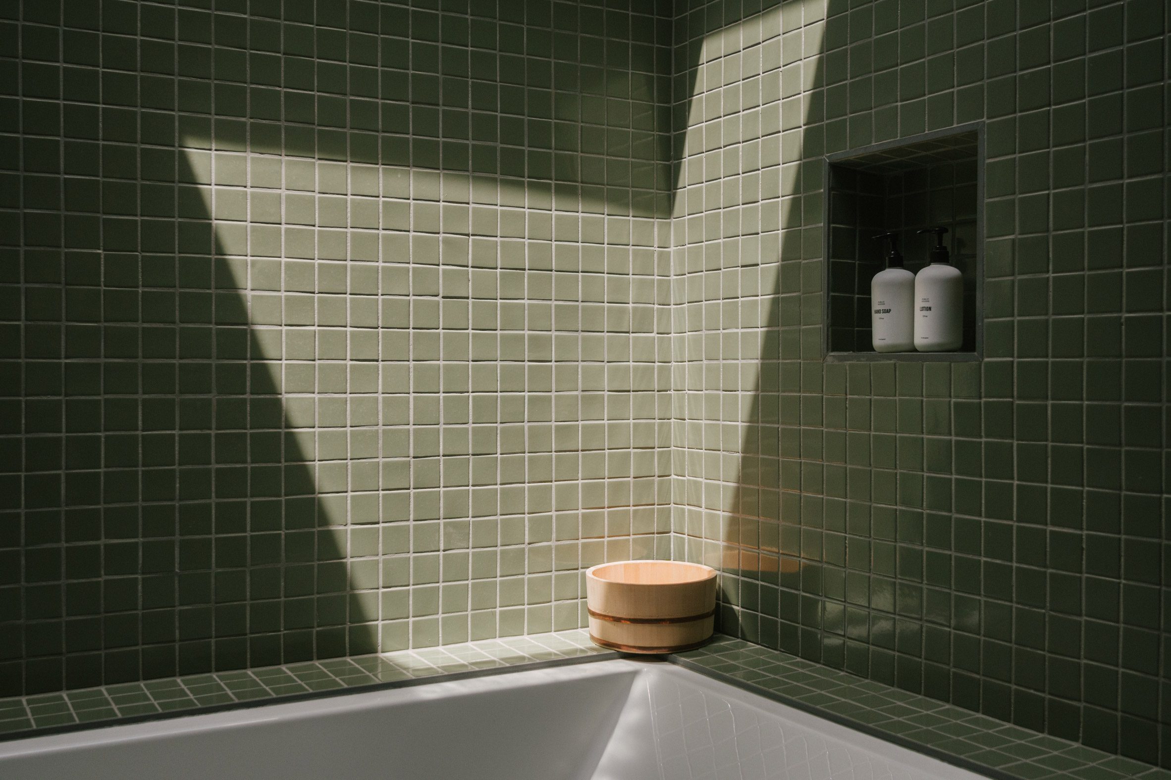 Zen Den has bathrooms with tiles from Fireclay