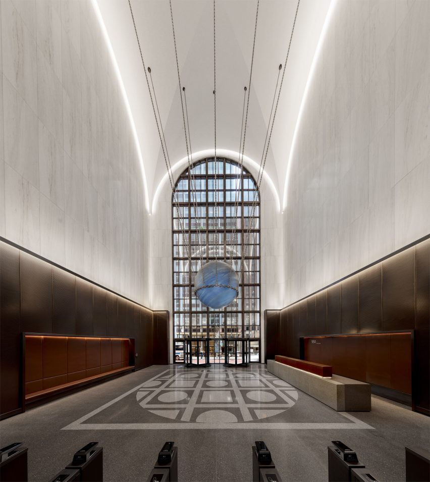 The lobby of 550 Madison features terrazzo marble and bronze 