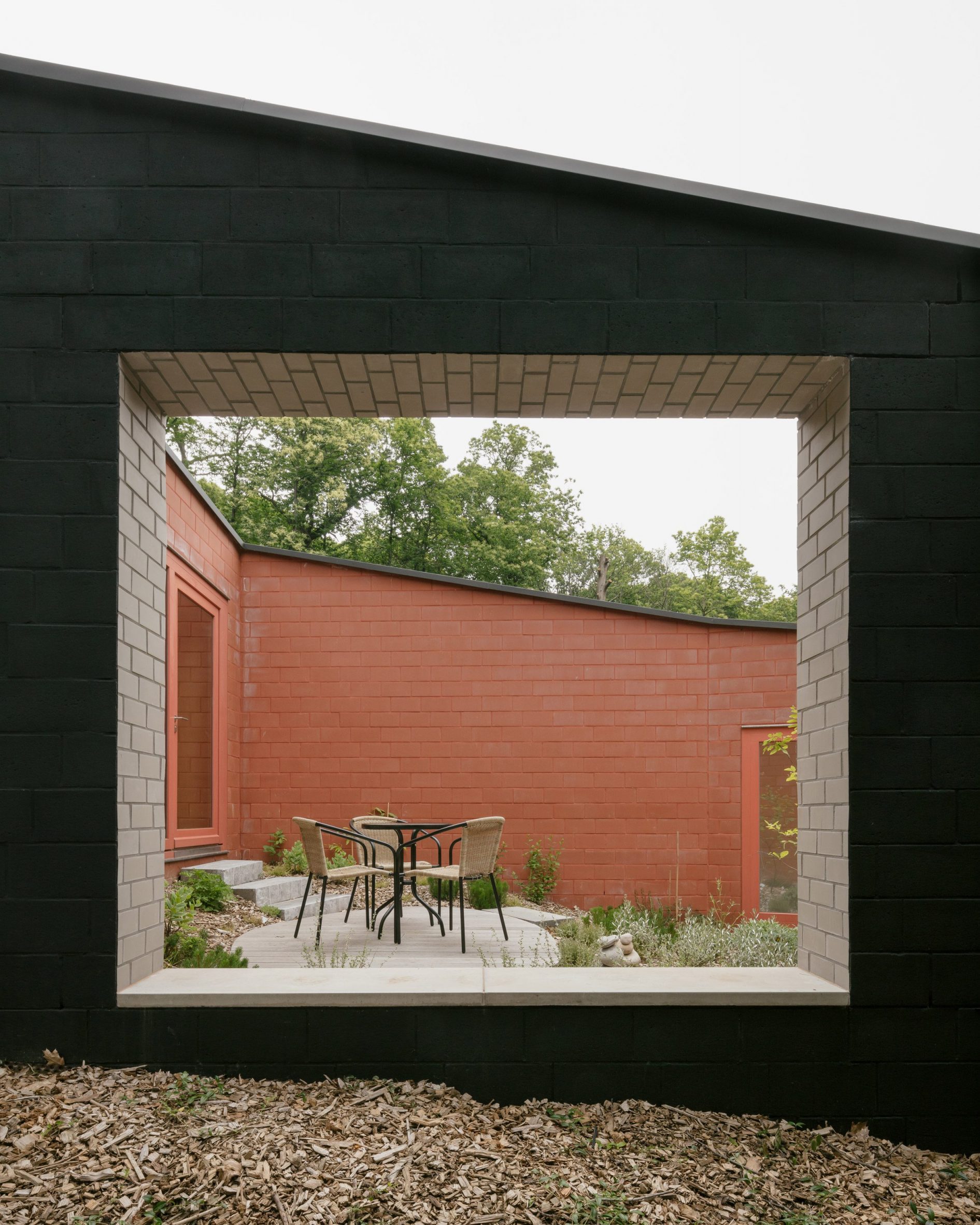 Window to terrace in brick house