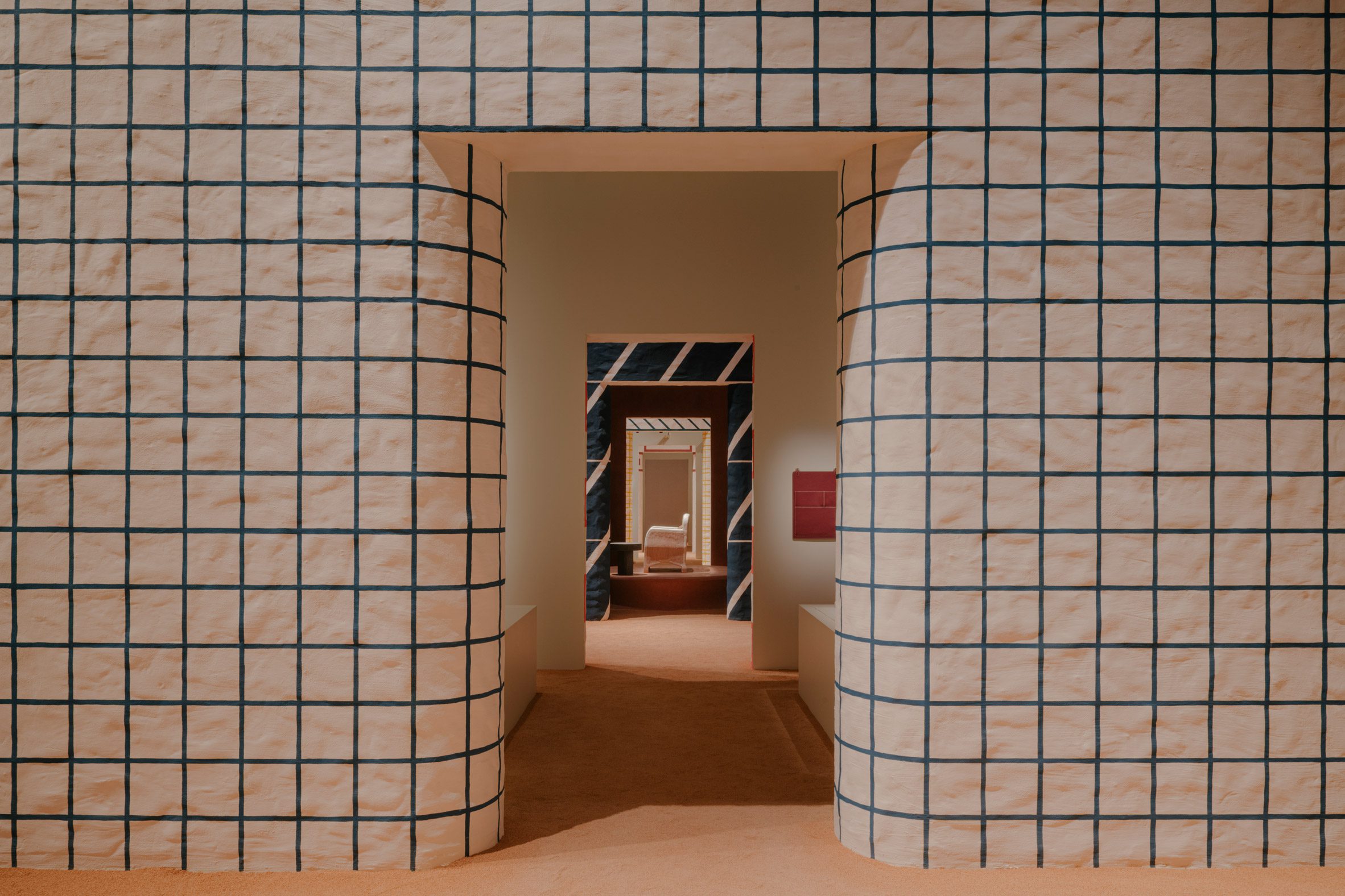 Hermes furniture inside a white doorway
