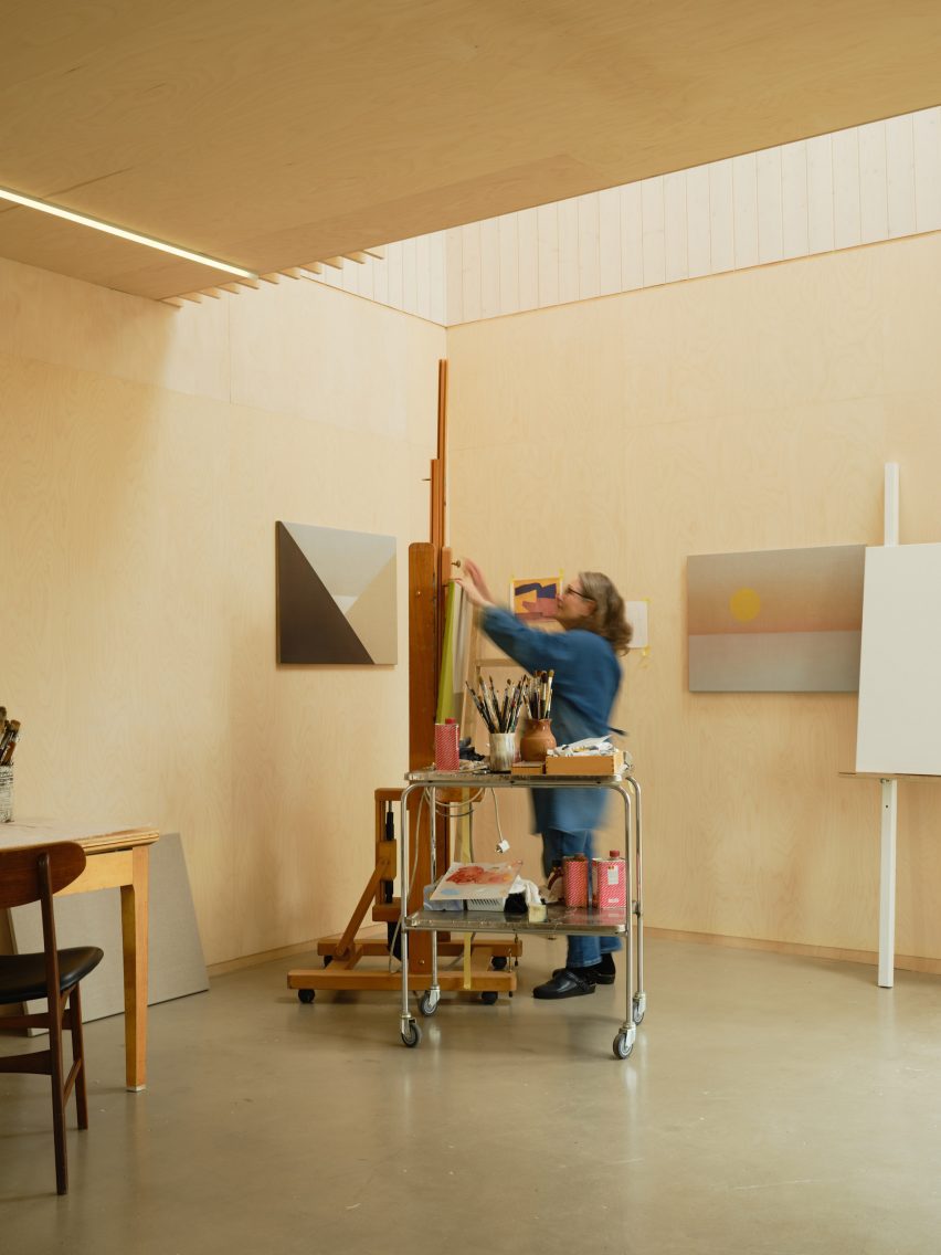A wood-lined artist studio