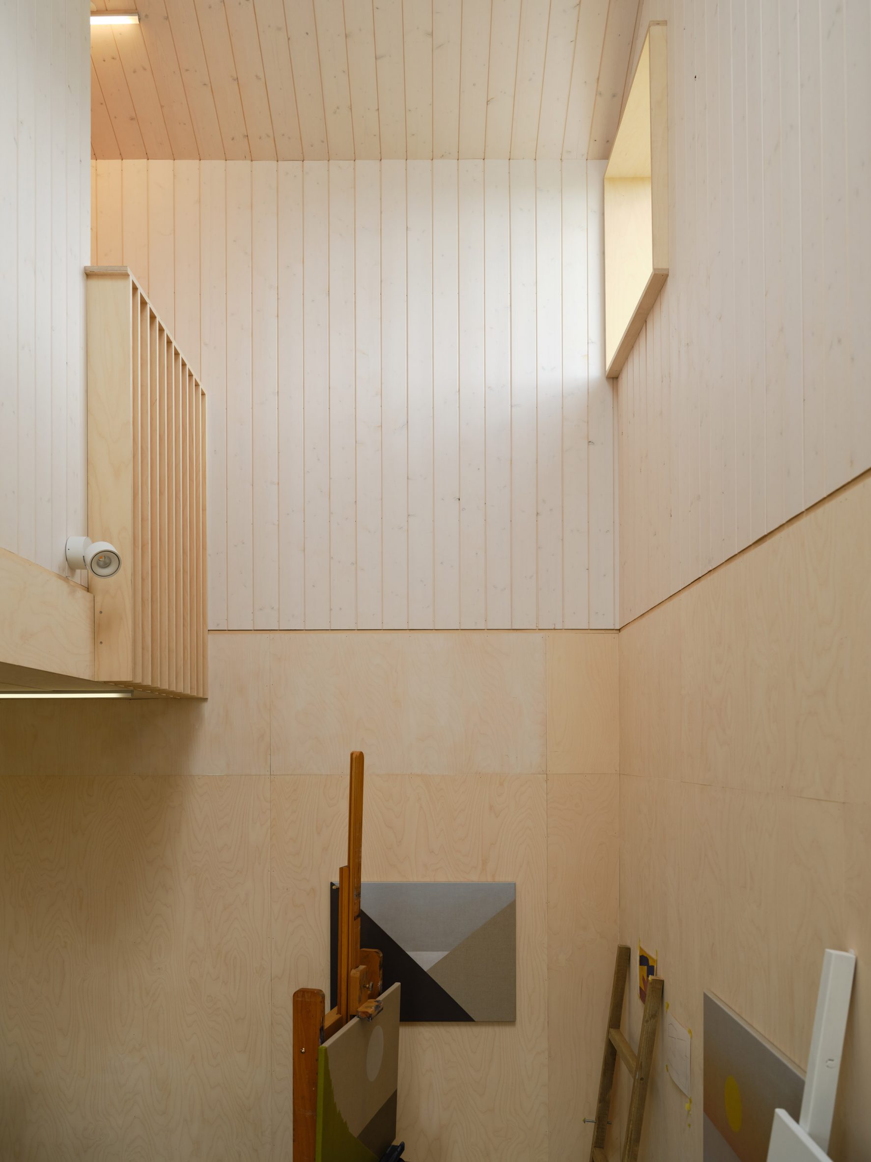 A wood-lined studio inside an Icelandic home