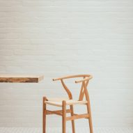 White kitchen with wooden chair