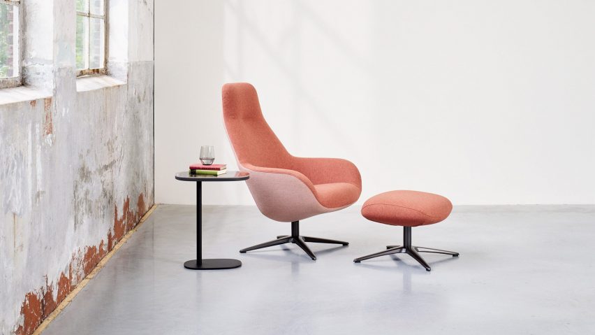 A pink high-backed LXR03 chair and footstool