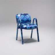 Armchair covered in blue floral print