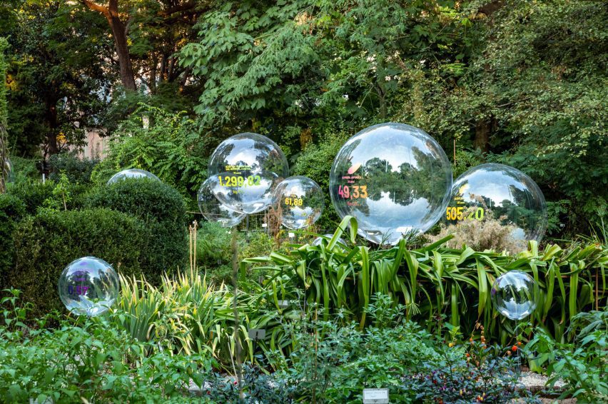 Natural Capital bubbles surrounded by plants at the Brera Botanical Garden