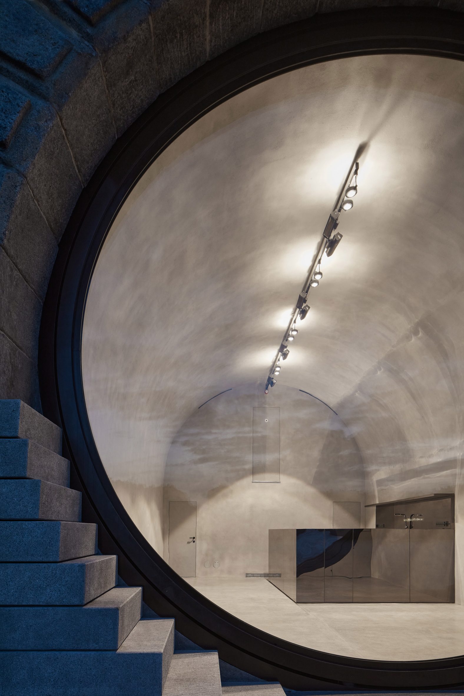 The interior of the vaults along the prague waterfront have a grey concrete finish