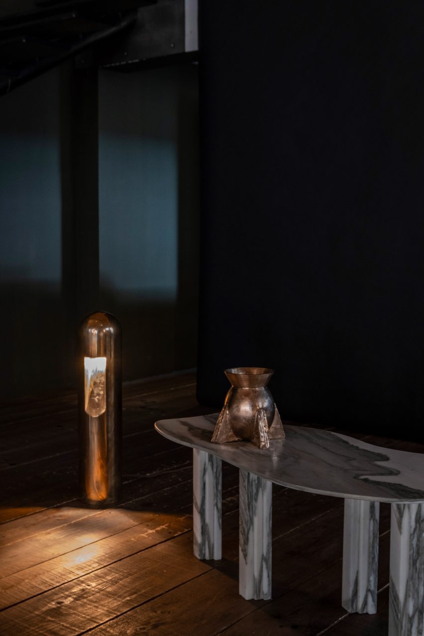 Marble table by Lorenzo Bini with bronze lamp and vessle by Rick Owens