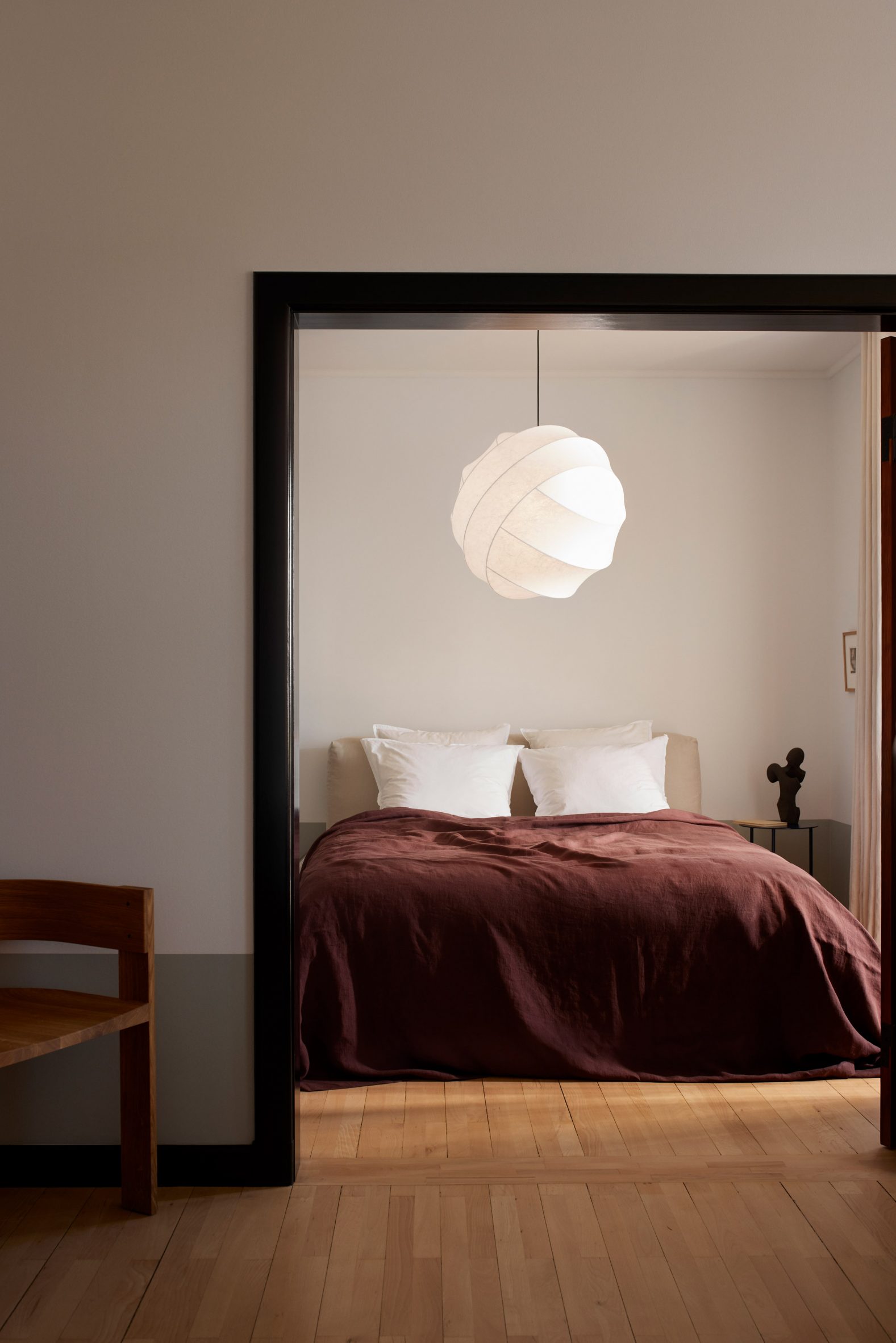Turner light hanging in a bedroom