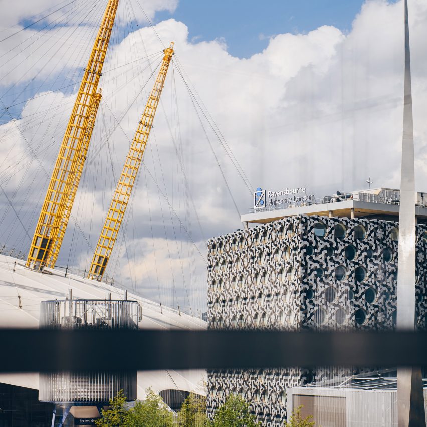 a photograph of buildings in tones of grey, white and yellow