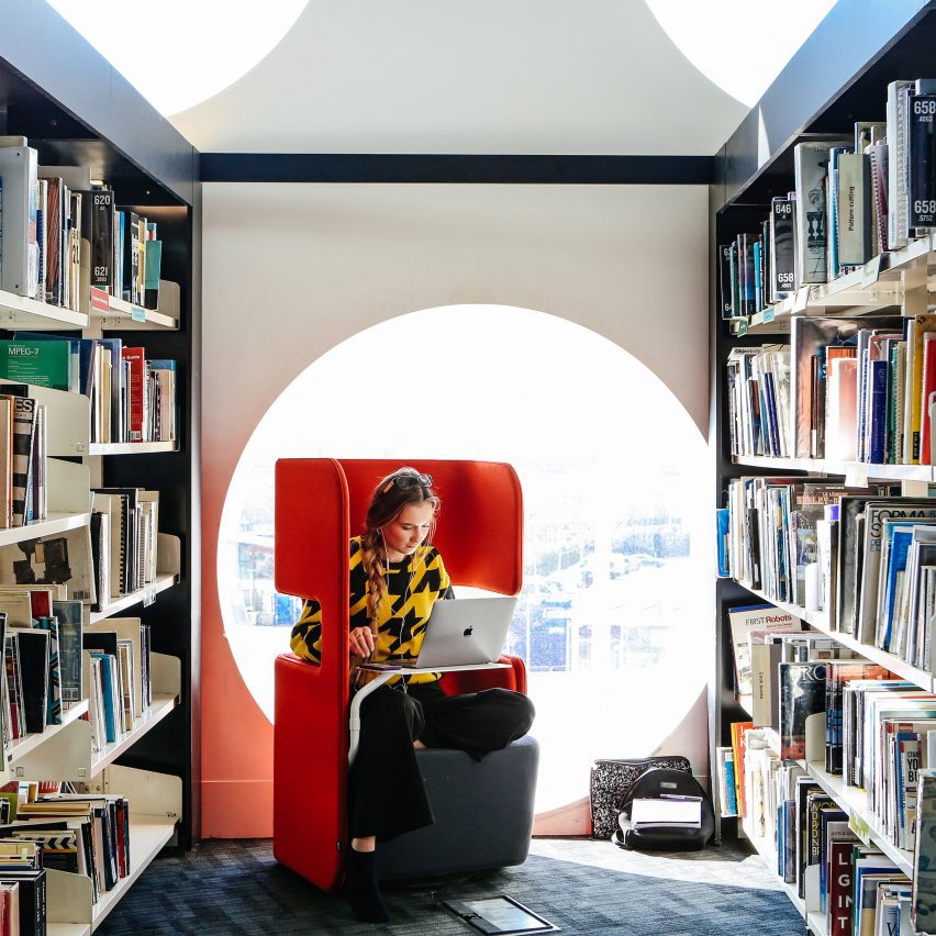 a photograph of a student in a library