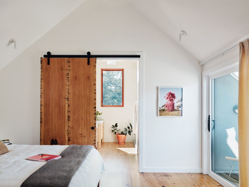 The master suite reveals the house's gabled roof