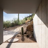 Concrete home by HK Associates looks onto the Arizona desert