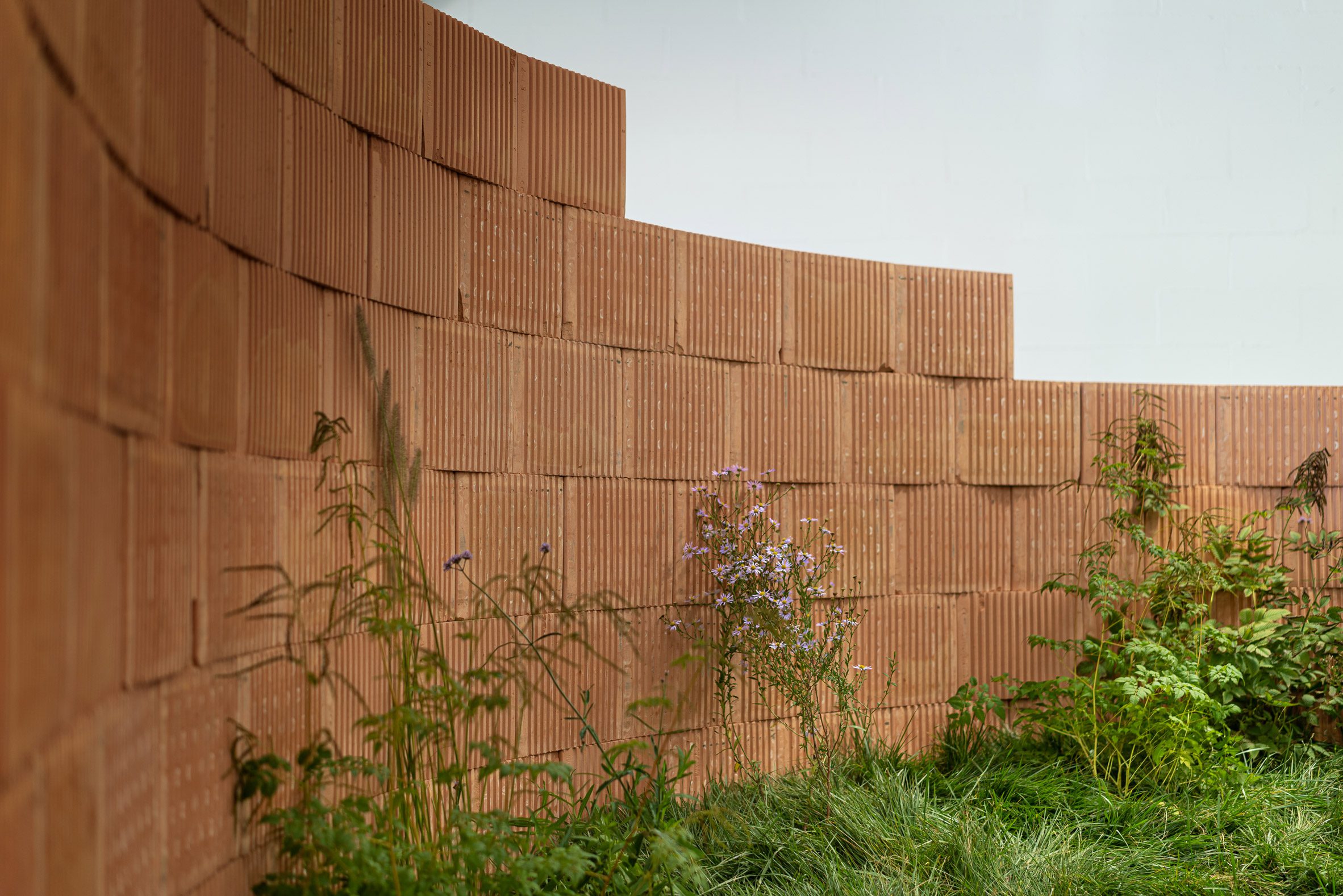 Brick wall in Vestre installation at Milan design week