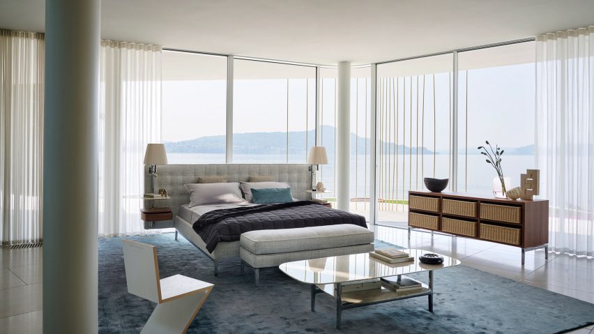 A photograph of the Cassina bed placed at the centre of the room