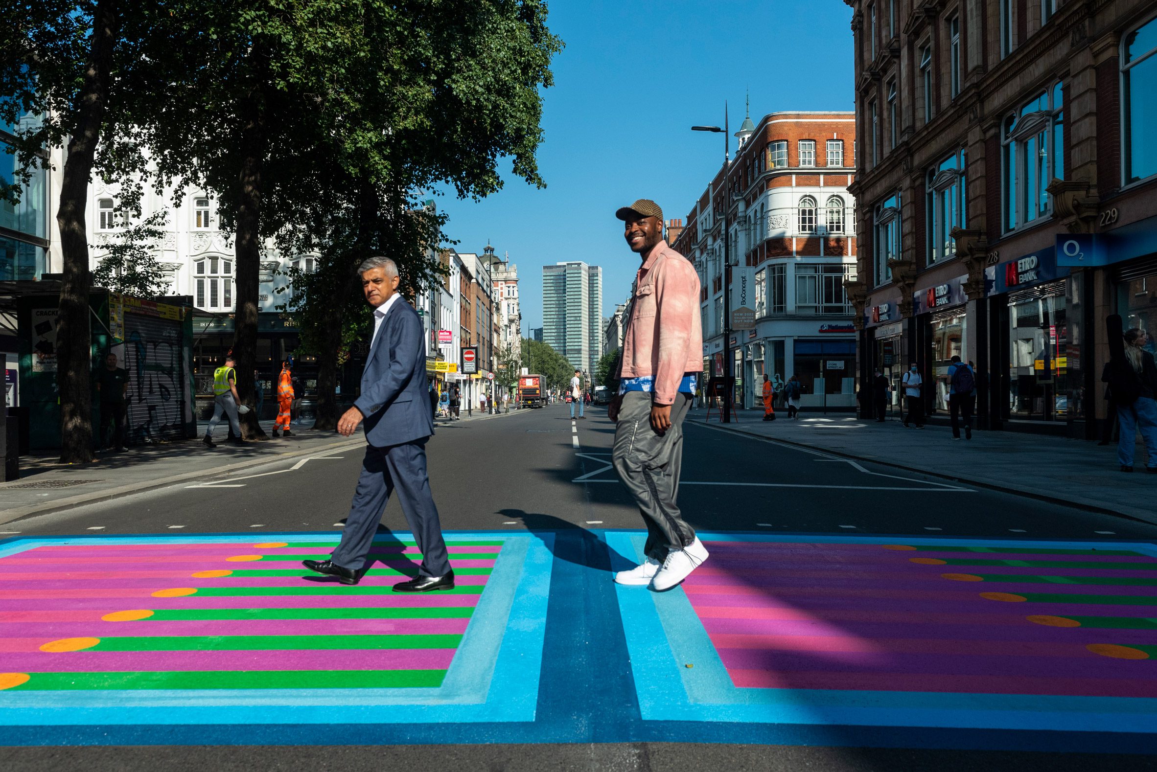 Yinka Ilori and Sadiq Khan stand on Bring London Together crossing