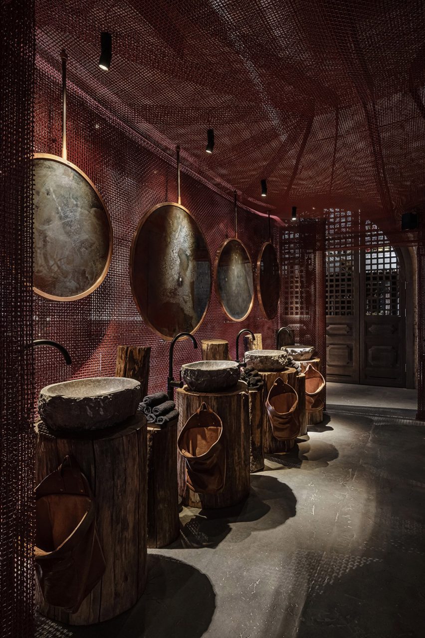 Mesh covers the ceiling and walls of the bathrooms of the Virgin Izakaya Bar