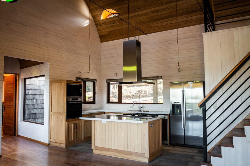Wooden kitchen in the vaulted house