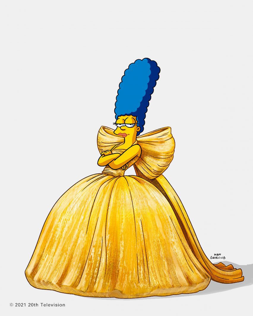 Marge simpson is pictured posing wearing a balenciaga dress