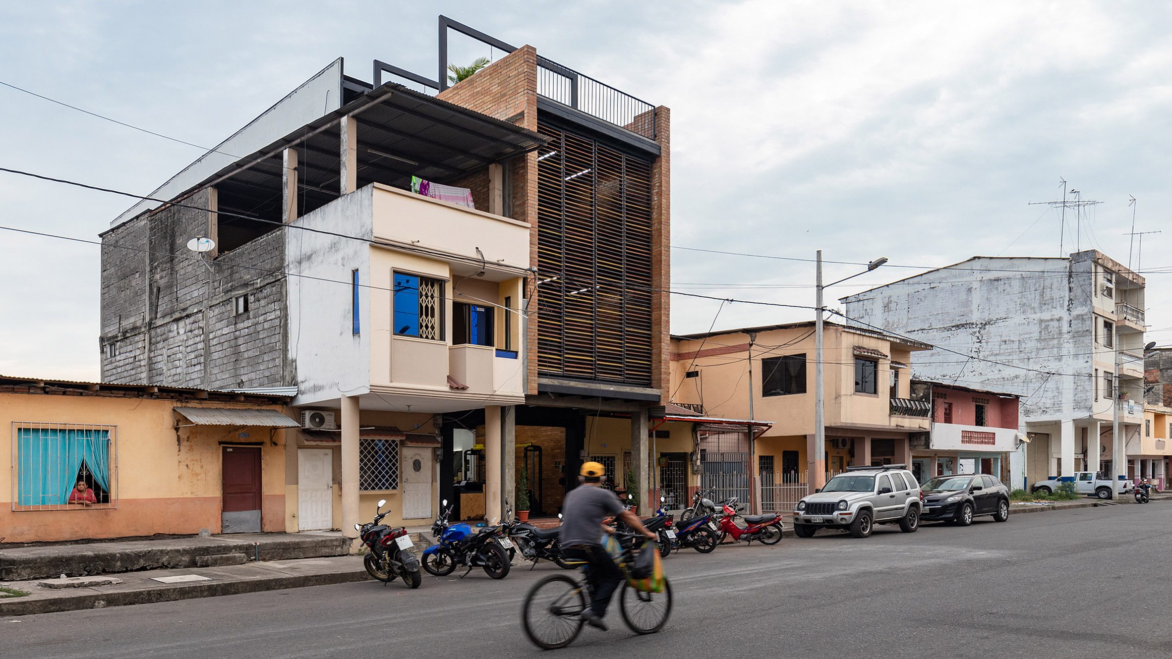 Giant shutters front Bardales fitness centre in Ecuador by Natura